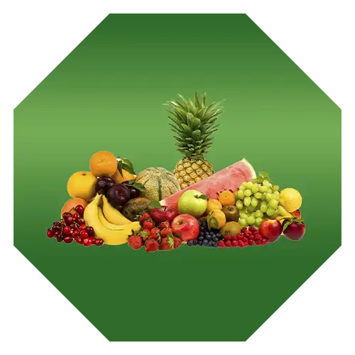 Assorted tropical and temperate fruits arranged on a green background